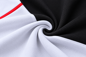 Ensemble de survêtement personnalisé pour femme avec fermeture éclair quart de tour, coloris blanc et noir, pour l'entraînement et le sport - Product Image 4