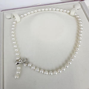 Collier de perles d'eau douce rondes de 7-8 mm pour femmes avec nœud, accessoires de mode avec des défauts discrets, vente en gros - Product Image 1