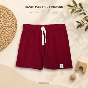 Pantalons basiques en coton doux de couleur cramoisie offrant un confort durable et un style élégant pour les enfants lors de leurs activités quotidiennes agitées. - Product Image 1