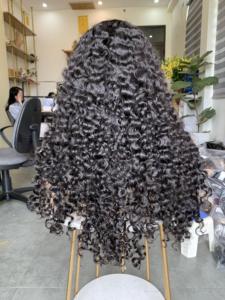 Venta al por mayor de pelo rizado euroasiático hacer peluca pelo vietnamita humano negro Natural - Product Image 5