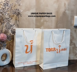 Luxury Custom Printed White <b>Paper</b> Shopping Bags with Rope Handles for Boutique Clothing Gift Packaging Wholesale - Product Image 1