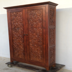 Armario de madera de caoba profunda de dos puertas con paneles florales tallados a mano, disponible a precios de mayorista. - Product Image 1