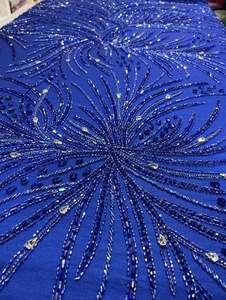 Tissu en tulle et dentelle de créateur avec broderies complexes de perles et de paillettes pour robes de mariée, mode haute couture et vêtements de soirée. - Product Image 3