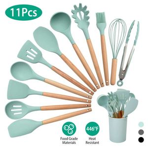 Set di 11 utensili da cucina in silicone con manico in legno, resistenti al calore: spatola, mestolo, paletta per spaghetti, pinze, frusta per uova, kit di strumenti da cucina - Product Image 1
