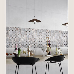 กระเบื้องพอร์ซเลนขนาด 600x600 มม. เสริมด้วยลวดลายแกะสลัก พื้นผิวด้าน ให้สัมผัสสบาย โทนสีธรรมชาติ สมดุลและมีพื้นผิวที่สวยงาม - Product Image 1