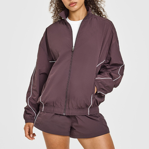 Ensemble de survêtement coupe-vent léger en nylon personnalisé pour homme avec veste à cordon de serrage et pantalon de jogging - Product Image 1