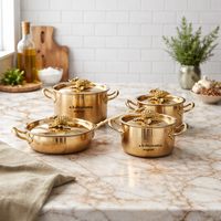 Ensemble de casseroles et faitouts en acier inoxydable, écologique, de conception européenne moderne, fabriqué artisanallement, avec poignées décorées motif raisins, de qualité alimentaire