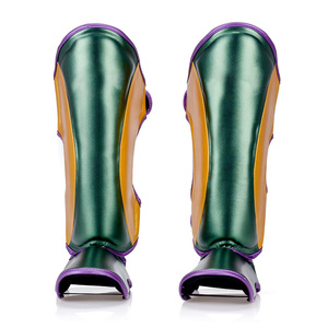Espinilleras de Cuero PU Rojo y Azul con Ajuste Flexible y Acolchado Protector para Boxeo, Kickboxing y Sparring - Product Image 6