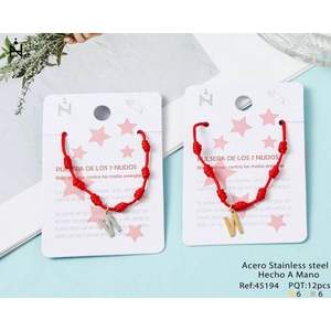 PULSERA-N Brazalete de Moda con Dijes de Acero Inoxidable, Diseño de Letra N y Nudo de Siete Estrellas - Product Image 1