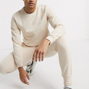 Pantalon de survêtement unisexe en coton crème avec poches latérales, taille élastique, coupe décontractée, idéal pour l'automne - Product Image 4