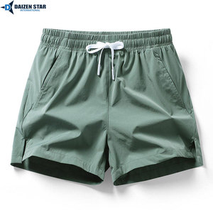 Short de bain pour homme DAIZEN STAR, séchage rapide, noir uni, cordon de serrage à la taille, short de plage décontracté, tissu tissé 100% polyester - Product Image 6
