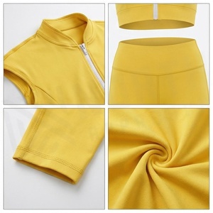 Ensemble de yoga 2 pièces North Approach jaune : Crop top sans manches et leggings taille haute longueur intégrale, sans couture, avec fermeture éclair frontale, couleur unie - Product Image 4
