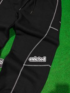 Pantalones de chándal de felpa de algodón 100% de 480 GSM de alto gramaje con bordado, costuras de panel modernas, estilo jogger, streetwear con punto de cruz y puños. - Product Image 4