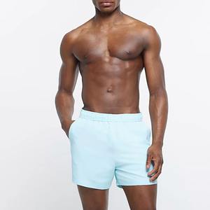 ผู้ผลิตทองคำ รับบริการ OEM ODM กางเกงขาสั้นว่ายน้ำชายหาดลำลองพิมพ์ลายกราฟิกตามสั่ง ทรงหลวม ใส่สบายสำหรับฤดูร้อนและวันหยุด - Product Image 1