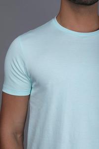 เสื้อยืดคอตตอน 100% คอกลม แขนสั้น สีขาวล้วน เนื้อผ้าถัก ระบายอากาศได้ดี มีไซส์ใหญ่สำหรับผู้ชายและผู้หญิง - Product Image 1