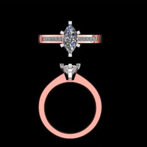 Bague de fiançailles en diamant taille marquise avec alliance sertie en canal et ensemble de mariage assorti en chevron incurvé en or rose massif - Product Image 1