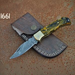 Damascus Steel <b>Drop</b> Point Hunting Knife With Yellow Marbled Handle And Leather Sheath Model 1661 - Product Image 1