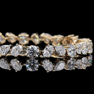 AMBER JEWELS สร้อยข้อมือเพชรทองคำแท้ 14k ดีไซน์หรูหรา ทรง Radiant Cut ประดับเพชรแบบ Claw Setting เหมาะสำหรับทั้งชายและหญิง ใช้ในงานแต่งงาน ได้รับการรับรองจาก IGI รุ่น P-585 - Product Image 1