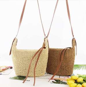 Discover the ultimate urban <b>accessory</b> with this stylish Natural yarn bag featuring a structured brown body and long shoulder - Product Image 5