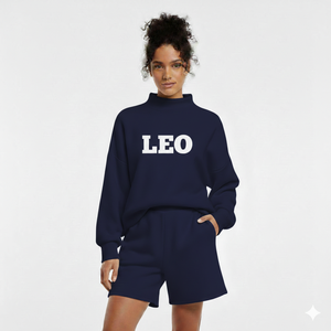 Contemporary Women's Winter Mockneck and Above <b>Knee</b> Shorts Outfit Featuring Generous Coverage Top and Smooth Tailored Shorts - Product Image 1