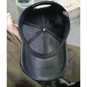 This is a grey and tan mesh adjustable trucker cap - Product Image 4