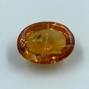 พลอยซิทรินสีเหลืองทองธรรมชาติ รูปไข่ น้ำหนัก 15.00 กะรัต ขนาด 14x18.80 มม. สำหรับทำเครื่องประดับ R.K. GEMS & JEWELLERY - Product Image 1