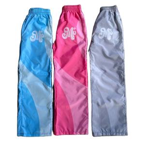 Pantalones de chándal cortavientos de nailon de pierna ancha de cintura media Unisex, ropa de calle de bloque de Color personalizada, pantalones de nailon Unisex transpirables al por mayor - Product Image 1