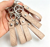 Porte-clés en cuir de cowboy personnalisé, créatif, faible MOQ, qualité assurée, exquis, durable, avec bracelet de poignet