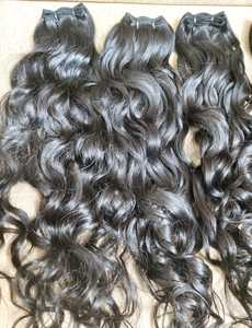 Extensions de cheveux humains ondulés de qualité supérieure pour des coiffures texturées et fluides, provenant d'un fournisseur indien à bas prix. - Product Image 3