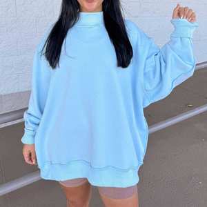 เสื้อสเวตเชิ้ตคอเต่าทรงโอเวอร์ไซส์สำหรับผู้หญิง สีพื้น แขนยาวทรงหลวม ผ้าถักเนื้อฝ้าย ใส่ได้ในช่วงฤดูใบไม้ร่วง - Product Image 1