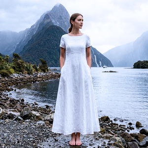 Robe midi vintage en lin biologique teint uni, faite à la main pour femme, taille haute, silhouette évasée, manches cloche, poches à nœud, respirante - Product Image 1