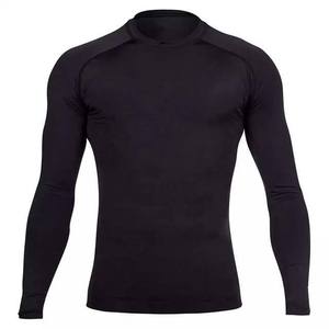 Camisetas de compresión deportivas personalizadas OEM para hombre, para gimnasio y entrenamiento, con sublimación, tipo Rash Guard para natación, con técnica de lavado. - Product Image 4