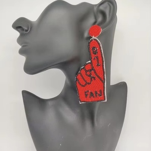 #1 Fan <b>foam</b> finger beaded earrings Beads Embellished Hand <b>Crafted</b> Parrot Stud Earrings from the brand BaubleBar - Product Image 1