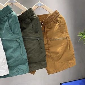 กางเกงขาสั้นผู้ชายฤดูร้อนผ้าบางทรงหลวมสบายๆ มีกระเป๋าซิป สีพื้น แห้งเร็ว ทรงตรง - Product Image 6
