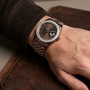 Luxury <b>diamond</b> wristwatch with dark dial roman numeral markers gemstone bezel magnified date window and elegant metallic - Product Image 4