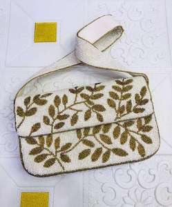 Sac bandoulière en toile blanche avec finition marron, style décontracté, sac fourre-tout promotionnel - Product Image 1