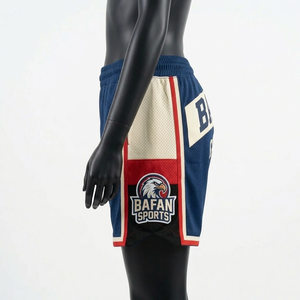 Shorts de basket-ball pour femmes de qualité supérieure, en polyester mesh bleu marine, avec empiècements latéraux contrastés et logo. - Product Image 4