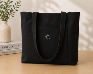 Sac fourre-tout minimaliste en toile noire avec broderie soleil, design uni, idéal pour le shopping en toutes saisons - Product Image 1