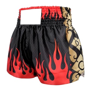 Custom Fire Graphic Muay Thai Shorts - Durable <b>Black</b> Satin <b>Trunks</b> with Gold Side Panels - Professional Martial Arts Fight Wear - Product Image 3