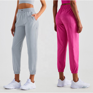 Jogging de sport à carreaux de haute qualité pour femmes, leggings décontractés, taille élastique, poches ajustables, sans couture, pour la pratique du yoga - Product Image 1