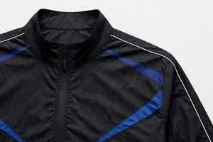 Veste coupe-vent sportive bicolore noir et bleu, manches longues, col montant, fermeture éclair, légère, en polyester - Product Image 3