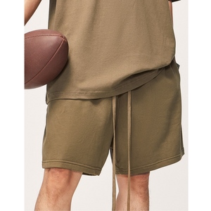 Pantalones cortos tipo bermuda de algodón de color liso para hombre con cordón en la cintura y bolsillos estilo casual - Product Image 2