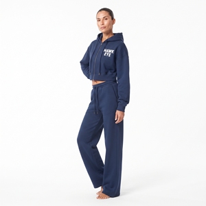Conjunto casual de dos piezas de alta calidad para mujer: sudadera con capucha y cremallera completa, hombros caídos, y pantalón jogger de pierna ancha con cintura elástica. - Product Image 3