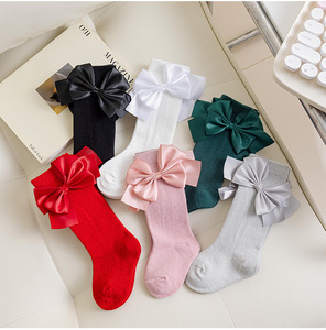 Venta al por mayor nuevo diseño hasta la rodilla princesa lindos lazos <span class=keywords><strong>recién</strong></span> nacido <span class=keywords><strong>medias</strong></span> acogedoras algodón color caramelo bebé calcetines largos - Product Image 1