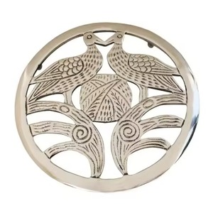 <b>Trivets</b> silver finish round metal <b>trivet</b> featuring two birds nesting design for hot dishes and table protection <b>trivets</b> - Product Image 1