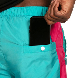 Pantalon de survêtement coupe-vent personnalisé, résistant à l'eau, bas de tenue sportif, fabrication export Pakistan, fournisseur OEM - Product Image 3