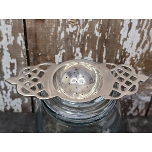 Indian Manufacturer of Metal <b>Tea</b> Strainer With Bowl Tabletop Kitchenware <b>Loose</b> <b>Tea</b> Strainer Filter With Floral Design Handle - Product Image 1