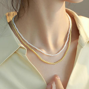 สร้อยคอดีไซน์หรูหราของผู้หญิงสวยงามสร้อยคอแฟชั่นแบบเป็นชั้นพร้อมลูกปัดข้าวไข่มุกโซ่กระดูกไหปลาร้าที่เรียบง่ายสง่างาม - Product Image 1