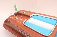 Bateau modèle artisanal en bois poli RIVA AQUARAMA, coque en bois naturel