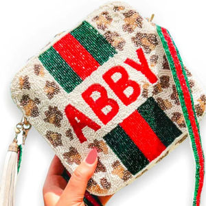 กระเป๋าสะพายข้างปักลายเสือดาวประดับลูกปัดพร้อมสายสะพายลายทาง กระเป๋าสะพายไหล่ทรงสี่เหลี่ยมพร้อมพู่ห้อยสำหรับผู้หญิง สามารถสลักชื่อได้ - Product Image 1